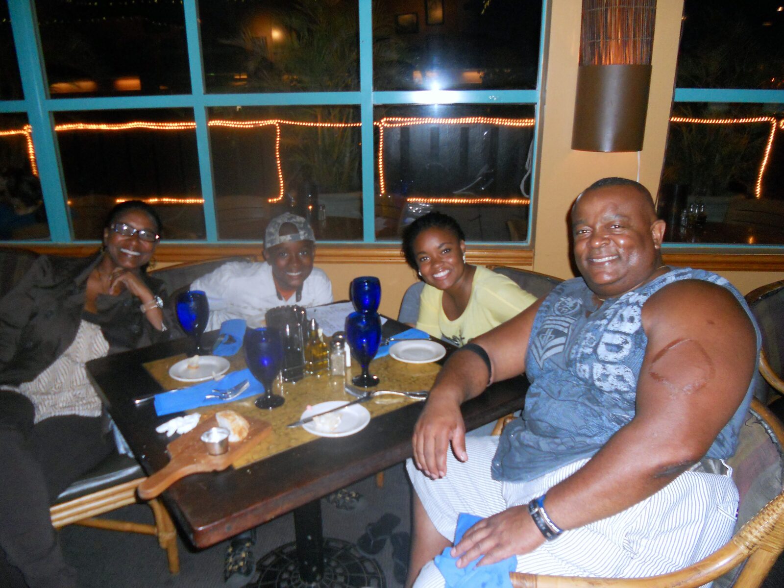 Group photo at a restaurant table