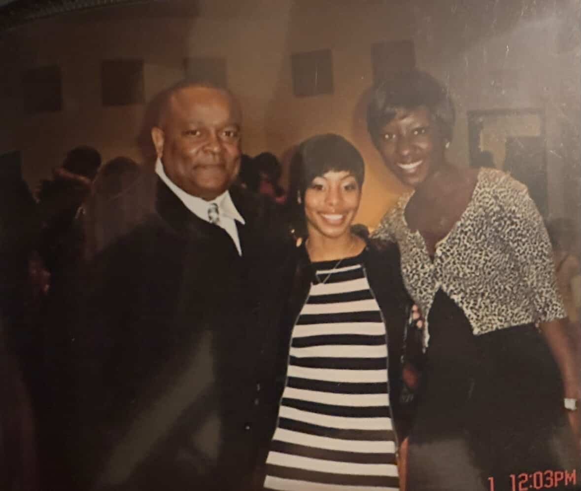Michael Gaiter dressed up with family at an event