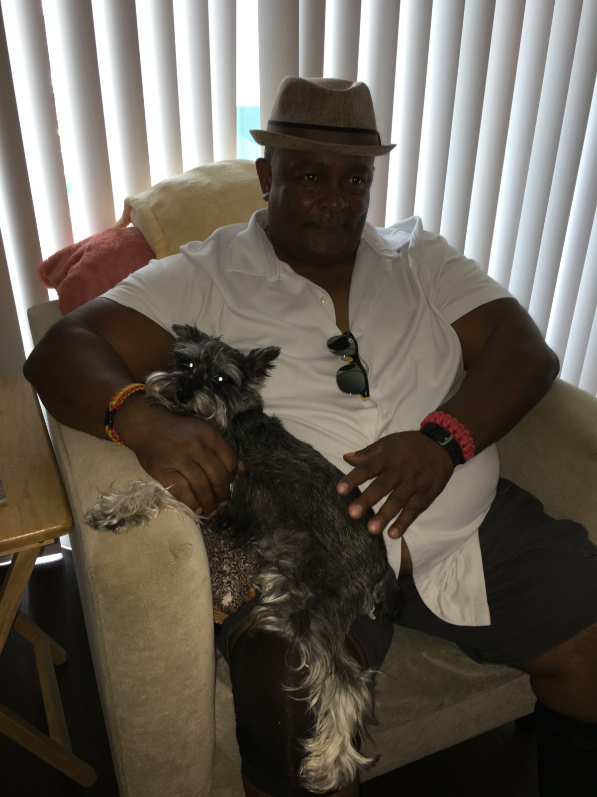 Michael Gaiter relaxing with his dog