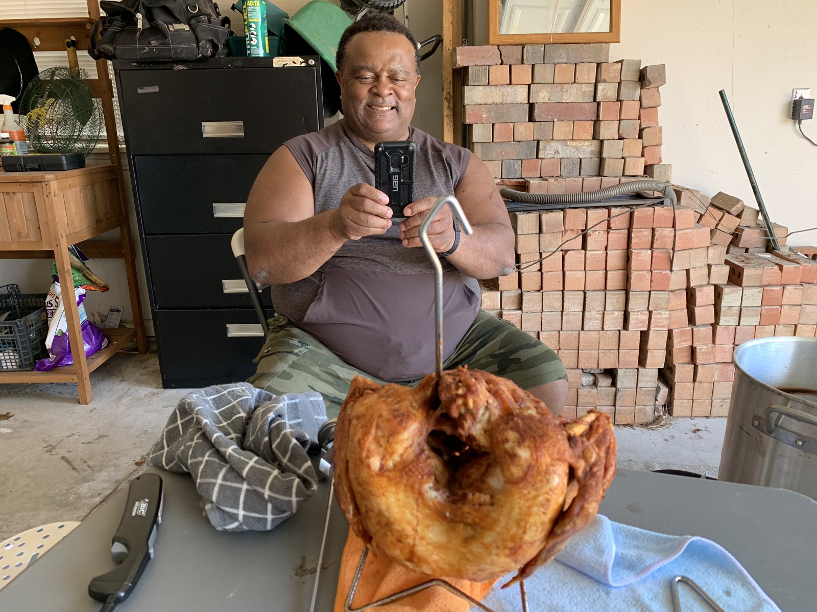 Michael Gaiter frying a turkey in the garage